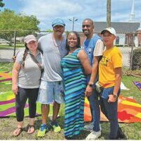 City of Florence Mayor Teresa Myers-Ervin joins community members during the Downtown Florence Community Mural Painting Event on North Dargan Street on July 9, 2022.