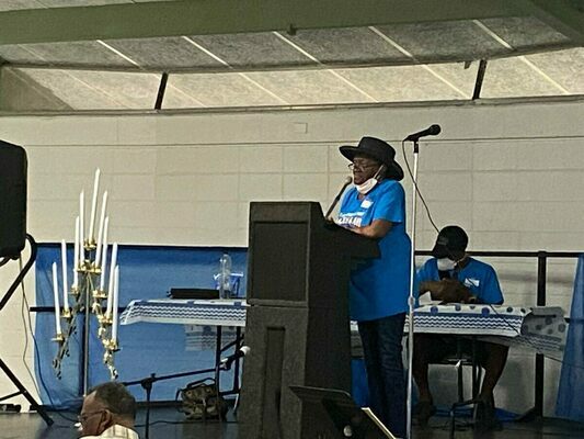 Committee member (great great grand daughter of Marcus and Amy Singleton) Ruth Carson delivers the family history during the 2022 Singleton Family Reunion event on Saturday, July 30, 2022 at Lynches River State Park.