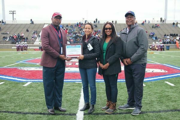 Left to right: Col. Alexander Conyers, SC State’s Interim President; Dr. Linda Bell, State Epidemiologist; Felicia Veasey, DHEC COVID Response Operations Director for the Lowcountry; and SC State Athletics Director Stacy Danley during DHEC’s award presentation at halftime of the Nov. 6 game.