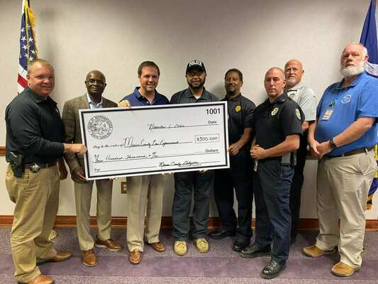 Senator Kent Williams and I were happy to present Marion County Law Enforcement with a check for $300,000. This money will be used to purchase portable radios for the Marion County Sheriff’s Office, Marion Police, Mullins Police, Nichols Police, and Sellers Police. 
This will also save our county and municipalities money by not having to go out and purchase these radios for our law enforcement. I’d like to thank Sheriff Brian Wallace for reaching out to me and asking to help secure funds so our law enforcement have what they need to protect the citizens of Marion County. I‘d also like to thank Speaker Murrell Smith, Rep. Phillip Lowe, and Rep. Jackie Hayes for making sure our law enforcement in rural areas have the resources they need to keep our citizens safe.