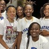Lake City Lady Panthers pose for a photo with Basketball Hall of Fame player and South Carolina Gamecocks Women’s Head Coach Dawn Staley.